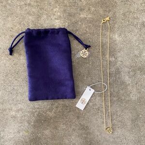 Tory Burch gold necklace, NWT and dust bag.